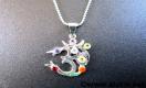 Chakra Om cut stone with chain pendant